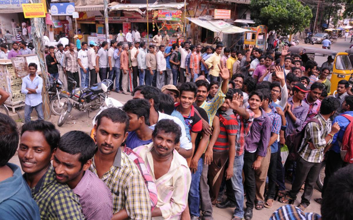 People queued up at a movie theatre in India